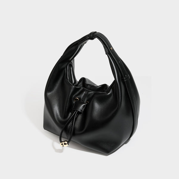 Slouchy hobo bag with smooth leather-look finish, drawstring cinch closure, and gold-tone bead hardware, front view