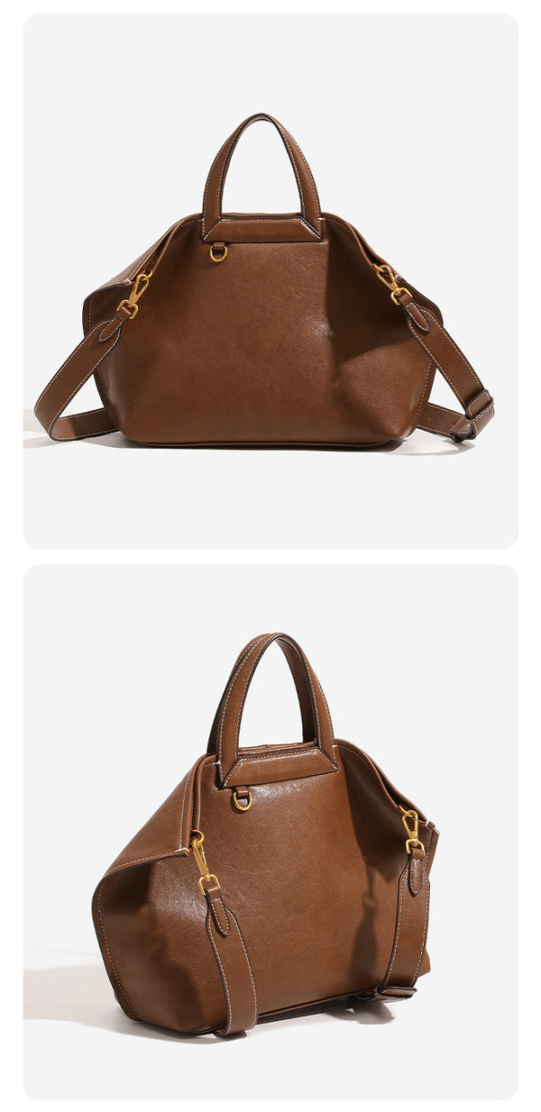 Structured cognac brown leather-look tote bag with fold-ear side panels, top handles, gold-tone hardware, and detachable