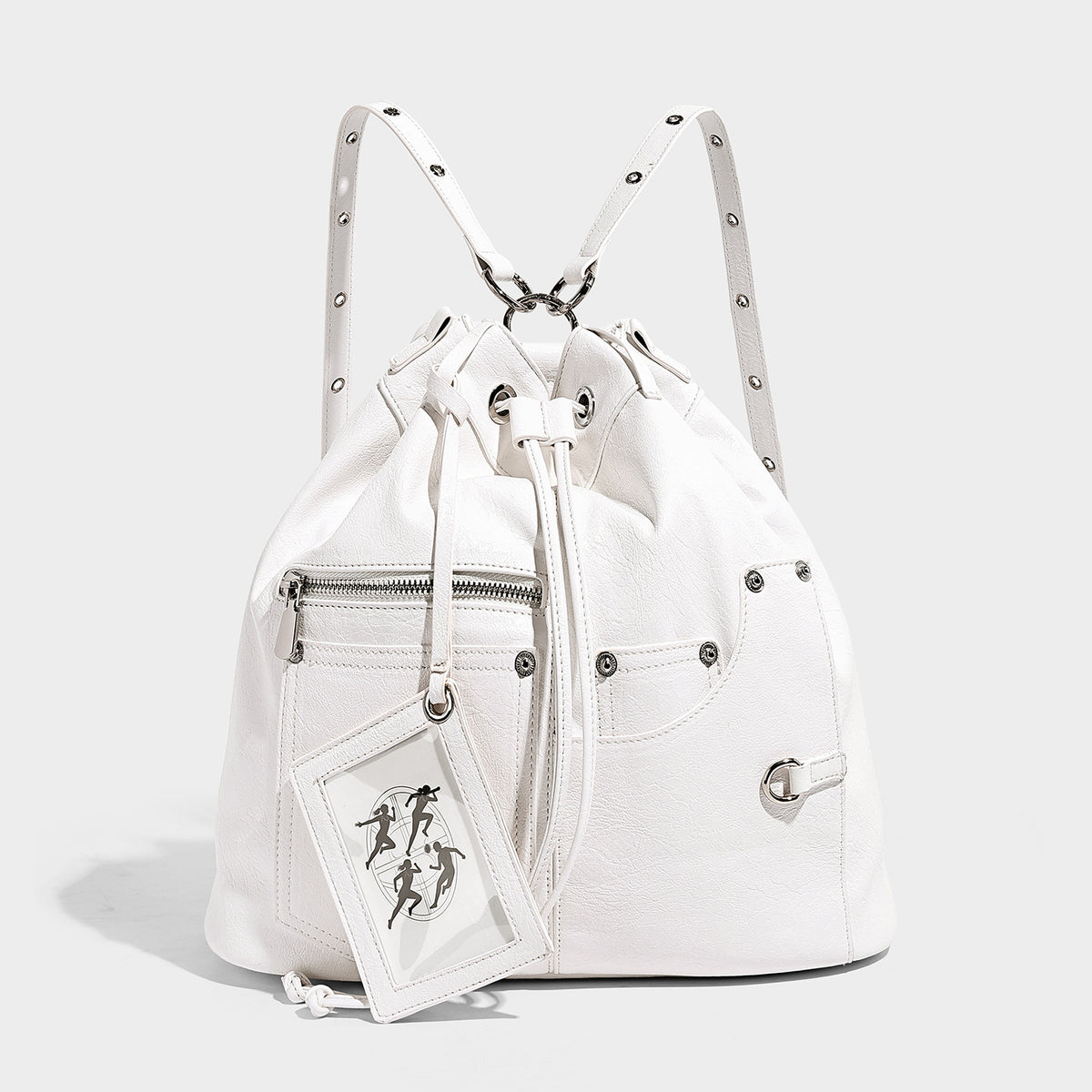 Glossy black convertible bucket backpack with silver grommet-studded straps, drawstring cinch closure, and front zip pocket