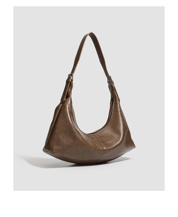 Slouchy crescent hobo shoulder bag with zip-top closure and adjustable strap, detail view 18