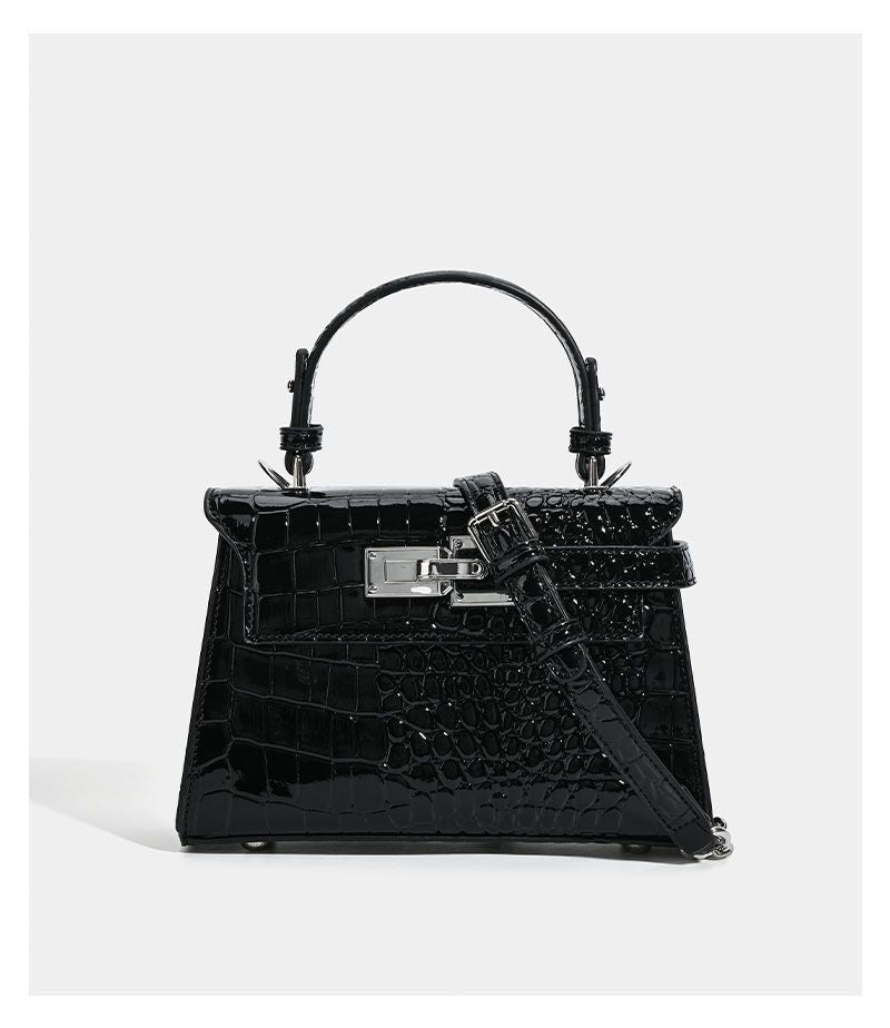 Croc-embossed mini top-handle satchel with silver turn-lock closure and adjustable crossbody strap, detail view 15