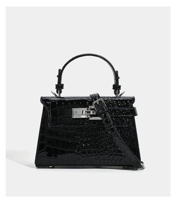 Croc-embossed mini top-handle satchel with silver turn-lock closure and adjustable crossbody strap, detail view 15