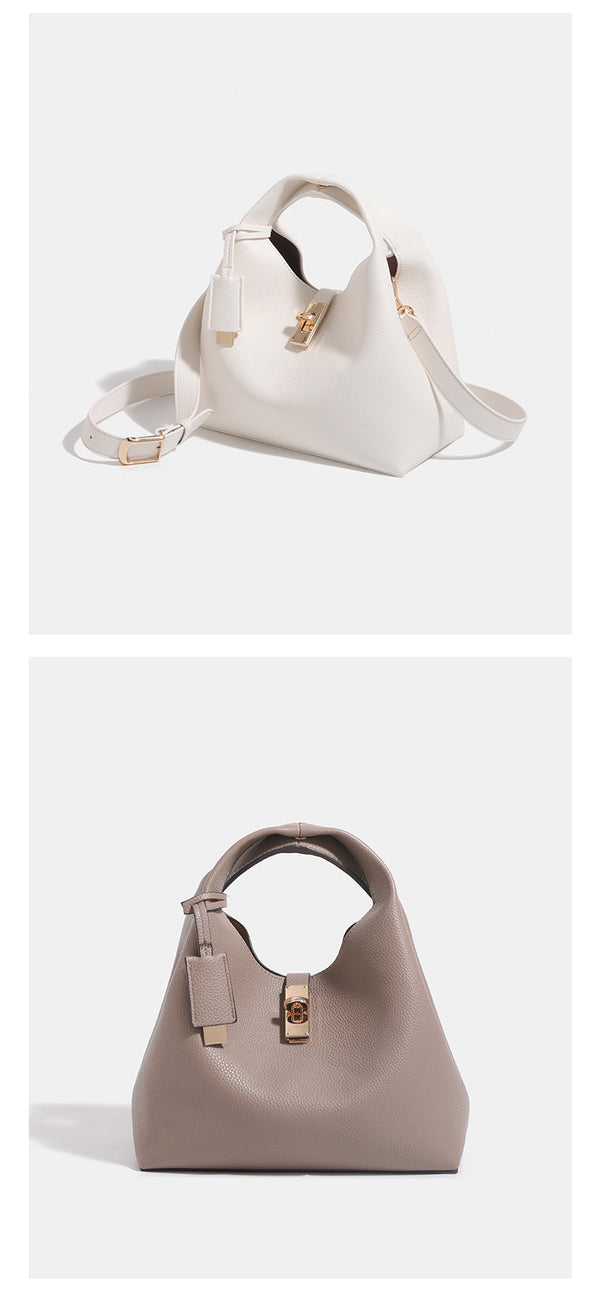 Structured pebbled leather-look bucket tote with gold-tone turn-lock hardware and looped top handle, detail view 9