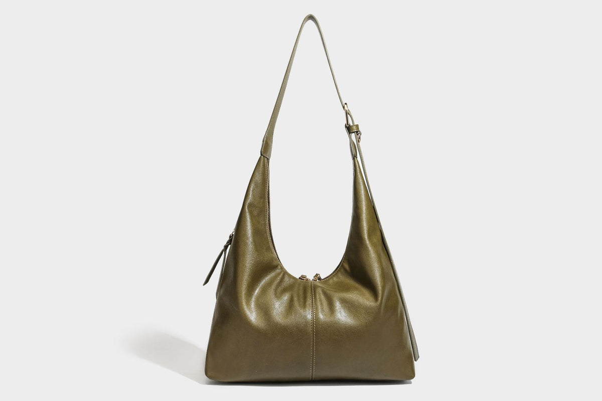 Lässig fallende Hobo-Schultertasche mit strukturierter Wildlederoptik, Reißverschluss oben, Quasten-Zippern und goldfarbenem, verstellbarem