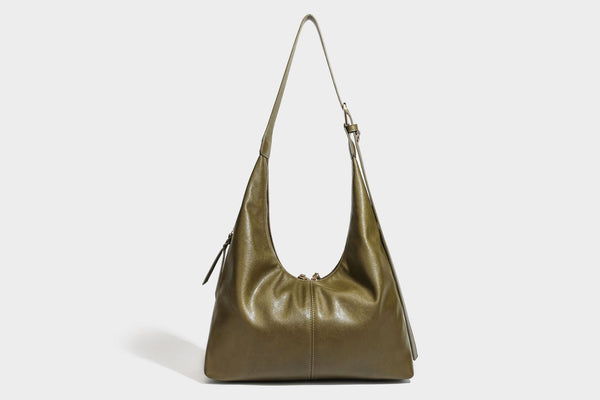 Lässig fallende Hobo-Schultertasche mit strukturierter Wildlederoptik, Reißverschluss oben, Quasten-Zippern und goldfarbenem, verstellbarem