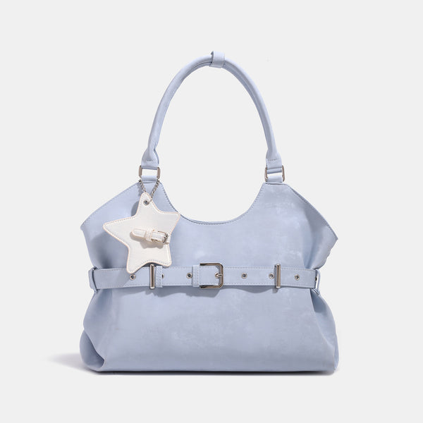 Large soft hobo shoulder bag with glossy textured finish, decorative belt buckle, star charm, and silver-tone hardware