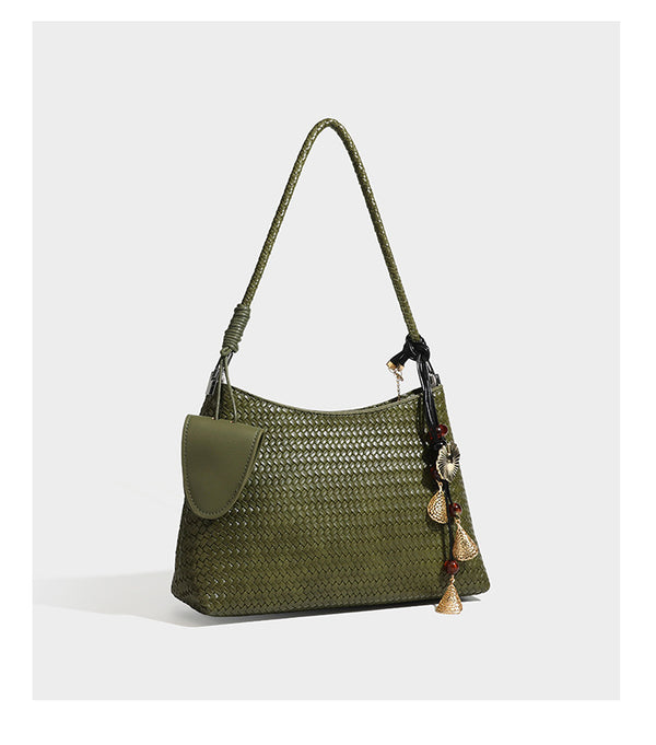 Woven-texture hobo shoulder bag in brown with braided top handle, adjustable crossbody strap, front flap pocket, and, detail