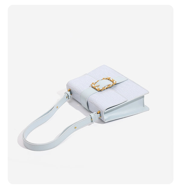 Structured crocodile-embossed flap shoulder bag with gold chain buckle hardware and adjustable strap, detail view 12