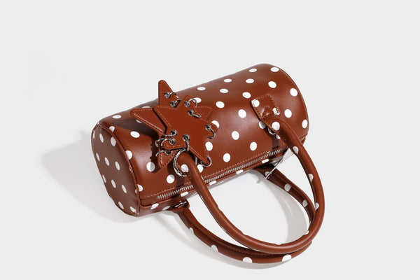 Glänzende gepunktete Barrel-Bag mit abgerundeten Henkeln, Sternanhänger und abnehmbarem Crossbody-Riemen, Detailansicht 42