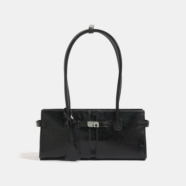 Structured glossy leather-look tote bag with long loop handles and silver turn-lock buckle closure, detail view 8