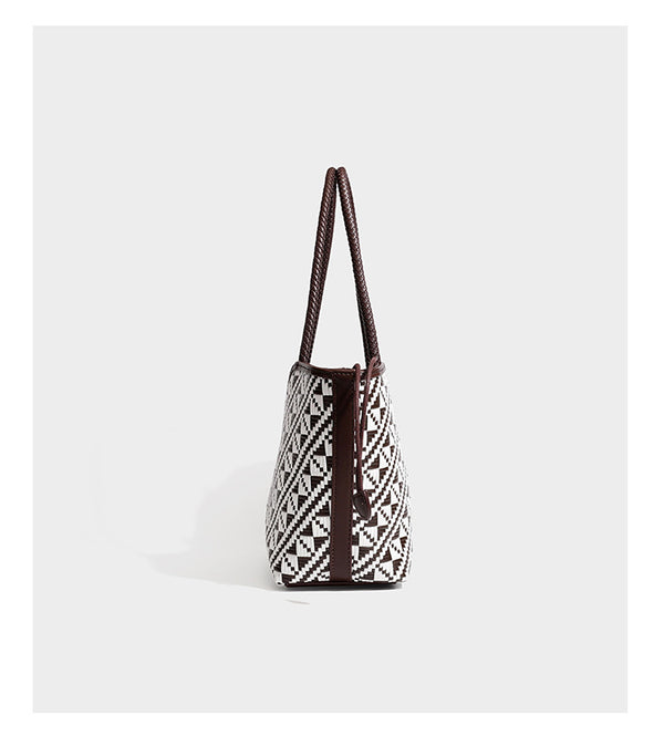 Woven geometric two-tone tote bag with braided shoulder straps and leather-look trim, detail view 13