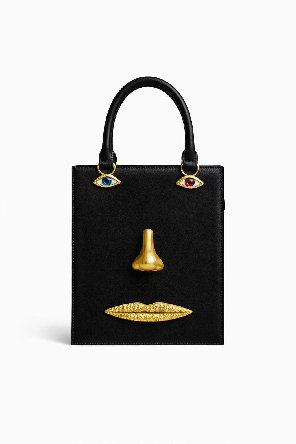 Structured rectangular top-handle bag in tan leather-look finish with gold-tone sculptural face hardware including