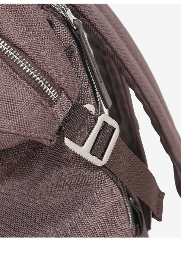 Structured matte-fabric backpack handbag with silver-tone zip closure and top carry handle, detail view 20