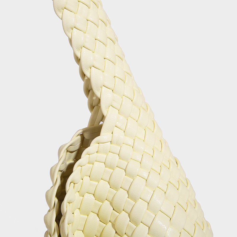 Soft hand-woven slouchy hobo tote bag with knotted tassel charm and single looped shoulder strap, detail view 34