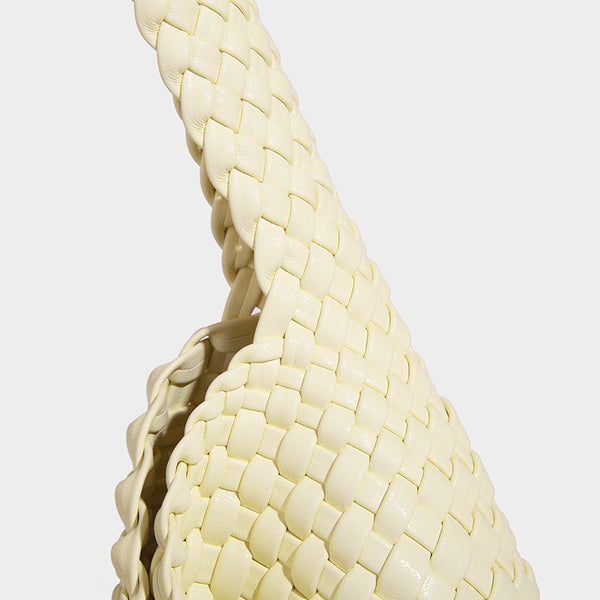 Soft hand-woven slouchy hobo tote bag with knotted tassel charm and single looped shoulder strap, detail view 34