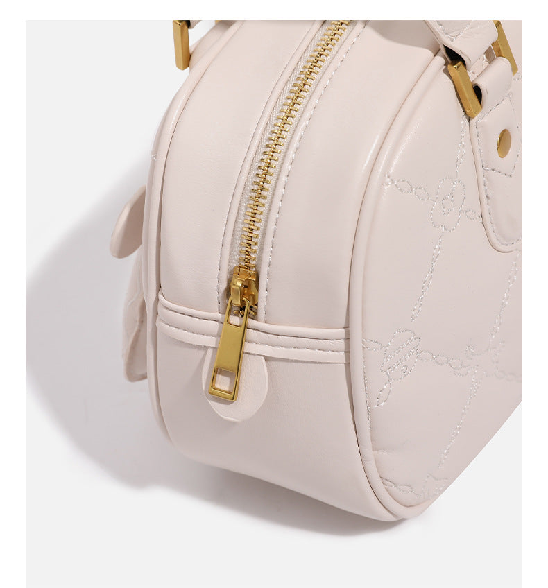 Small structured quilted leather-look zip shoulder bag with gold-tone hardware and adjustable strap, detail view 20