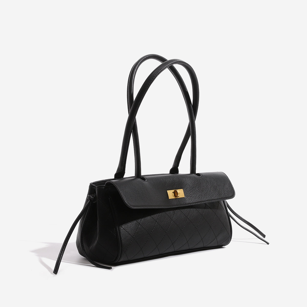 Structured quilted diamond top-handle underarm shoulder bag with gold-tone turn-lock flap closure and side tie straps, detail
