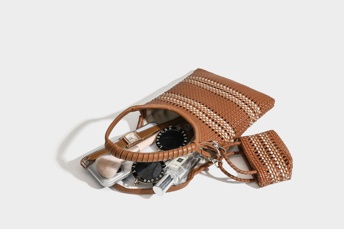Color-block woven tote bag with rounded leather-look handles, detachable crossbody strap, and matching mini clip-on pouch in