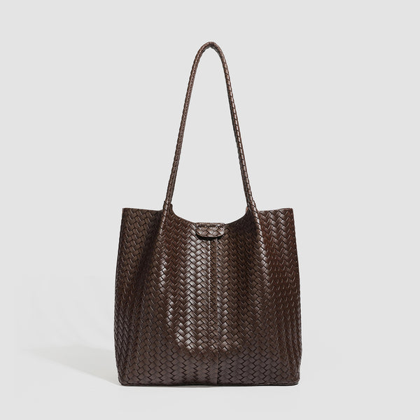 Large black basket-weave leather-look tote bag with long braided shoulder straps and matching woven zip pouch, detail view 10