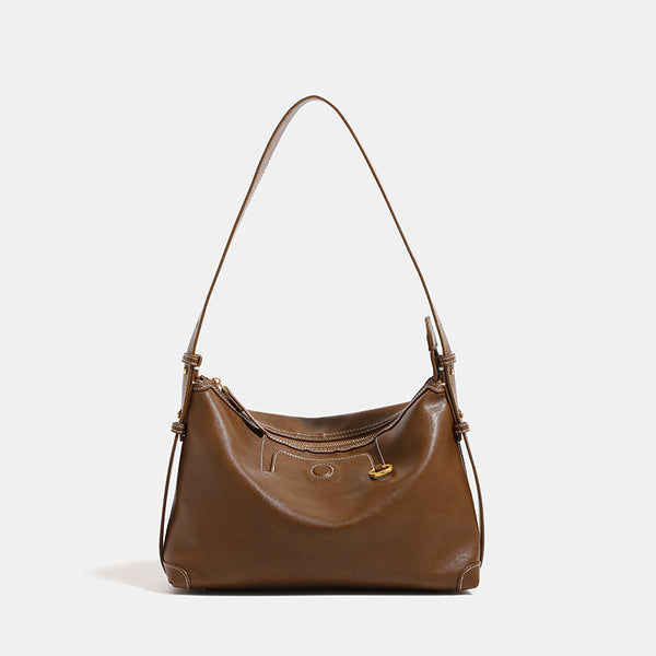 Smooth leather-look hobo bag with gold-tone ring hardware, contrast stitching, top handle and adjustable crossbody strap