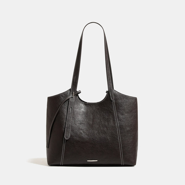 Structured open-top leather-look tote bag with long shoulder straps, contrast stitching, and side tie details, detail view 7
