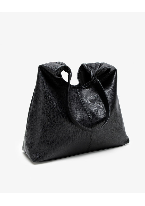 Large slouchy hobo shoulder bag in pebbled matte leather-look finish with single flat strap, detail view 10