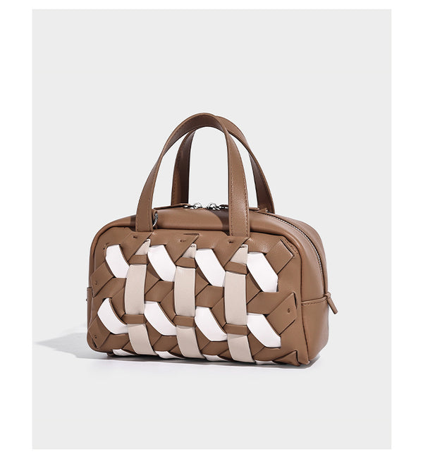 Small structured satchel bag with two-tone woven front panel, dual top handles, and detachable crossbody strap in tan brown