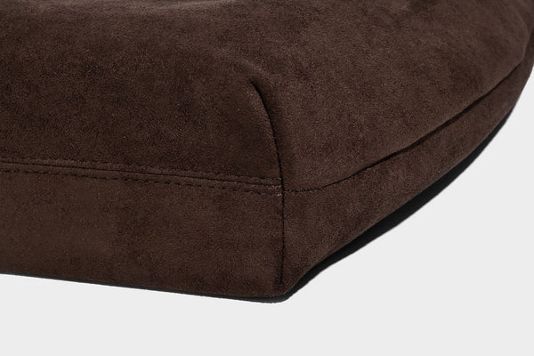 Slouchy crescent hobo shoulder bag in dark chocolate matte suede-look finish with adjustable strap and twin-pull top zip