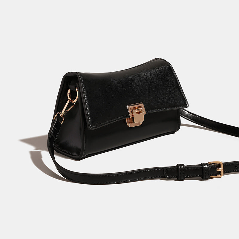 Compact structured flap shoulder bag with gold-tone turn-lock closure and adjustable strap, detail view 4