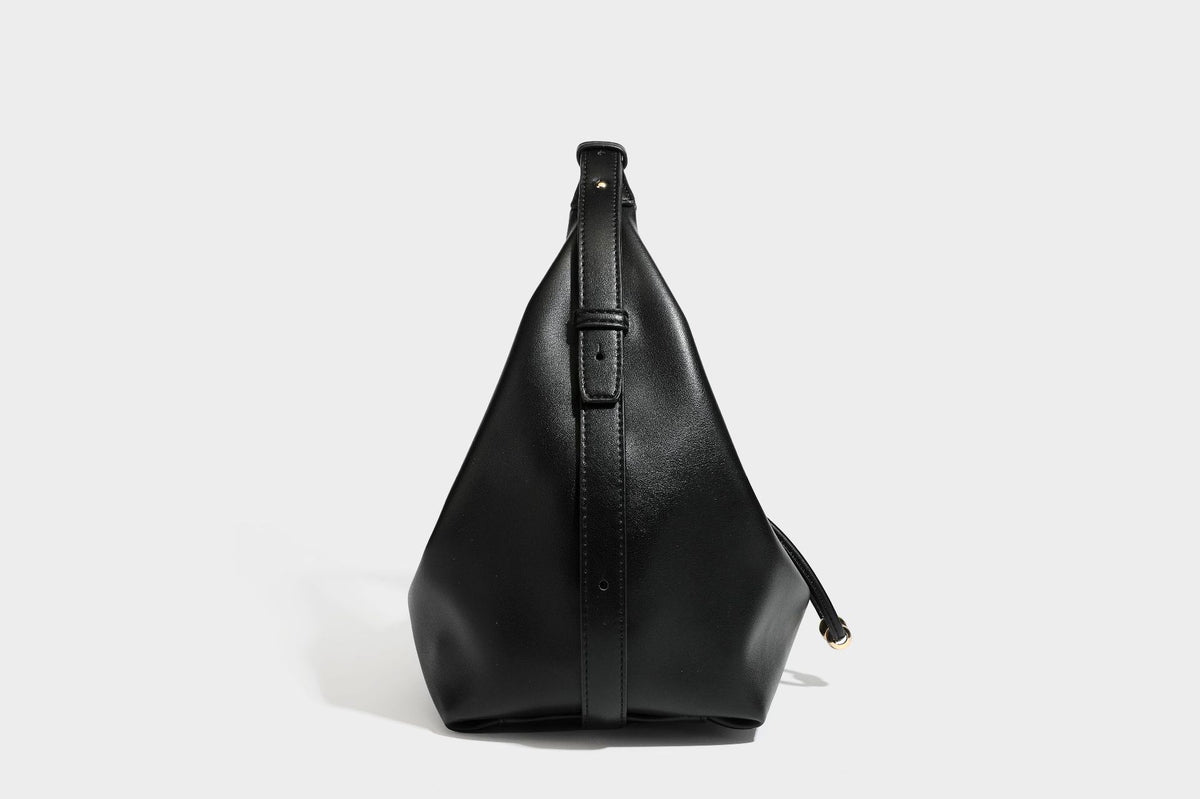Slouchy hobo bag with smooth leather-look finish, drawstring cinch closure, and gold-tone bead hardware, detail view 26