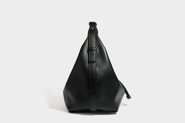 Slouchy hobo bag with smooth leather-look finish, drawstring cinch closure, and gold-tone bead hardware, detail view 26
