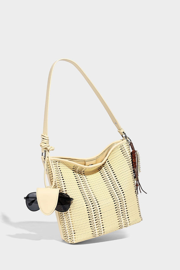 Woven bucket shoulder bag with leather-look trim, silver-tone hardware, and beaded tassel charm, detail view 25