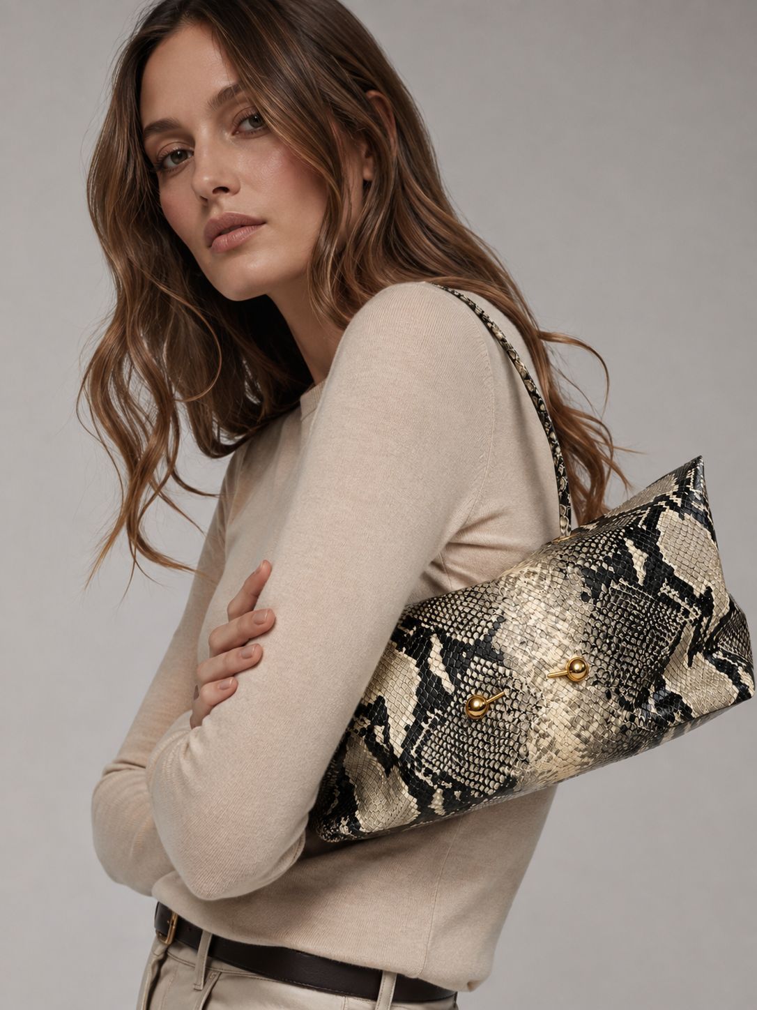 Wide embossed-texture shoulder tote bag with single loop handle and gold-tone toggle hardware, detail view 14