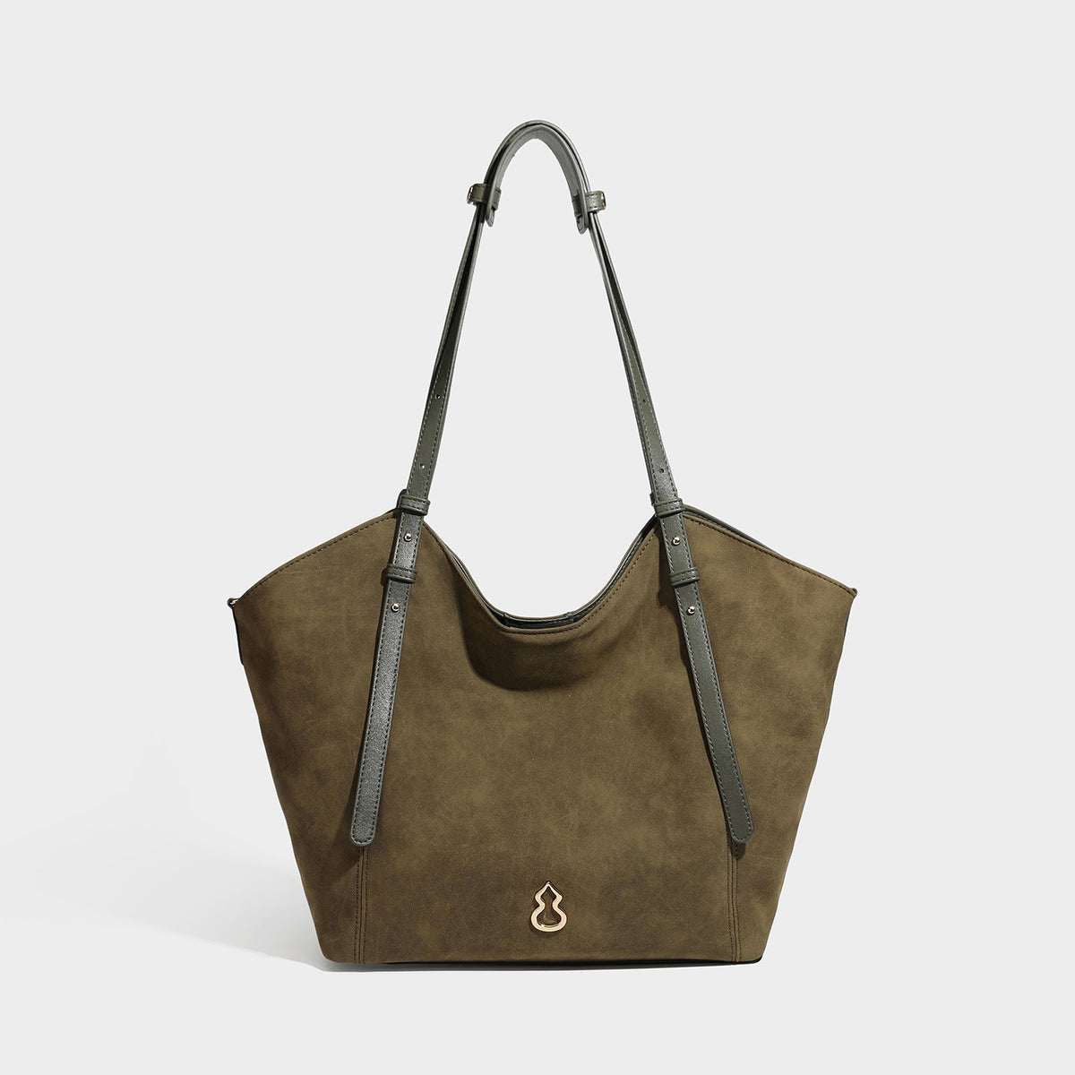 Oversized suede-finish tote shoulder bag in caramel brown with slim leather-look straps and gold-tone logo hardware, detail