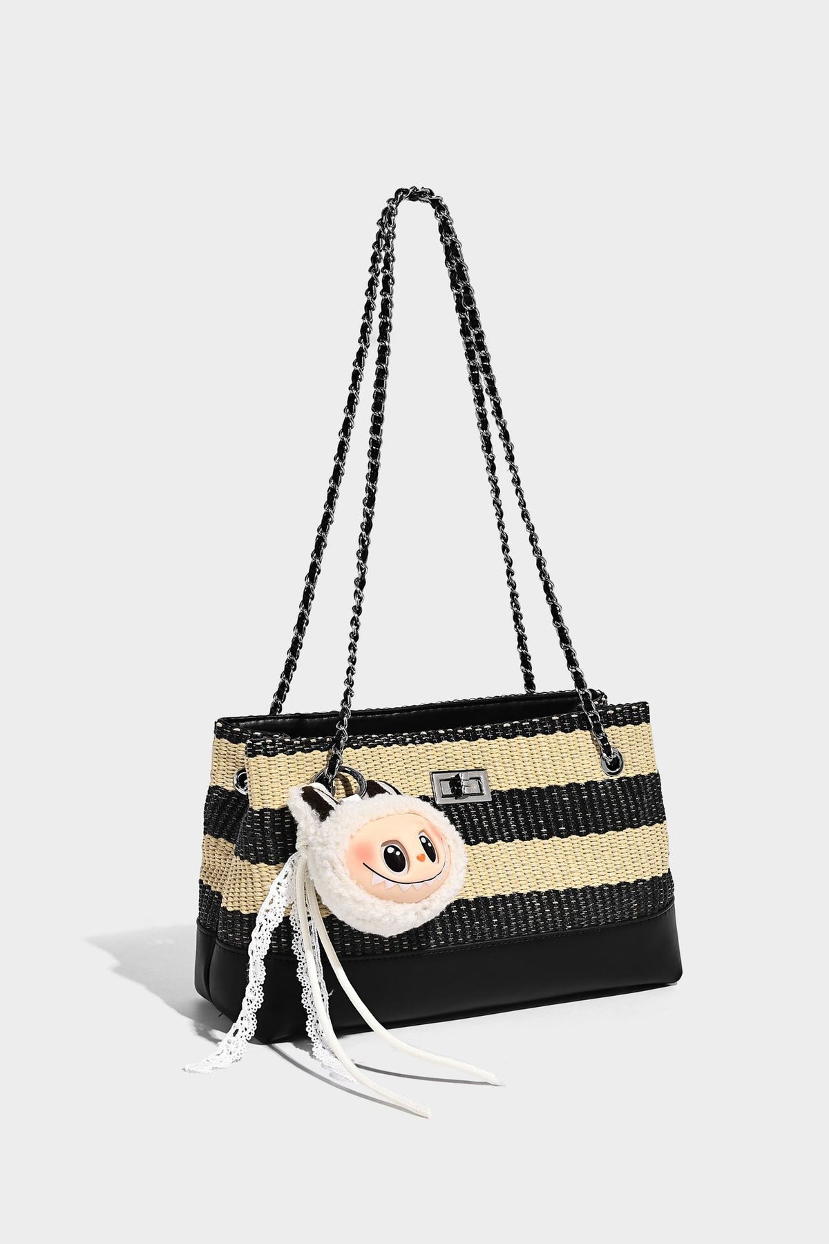 Structured black and beige striped woven shoulder bag with silver chain strap and turn-lock metal clasp, detail view 14
