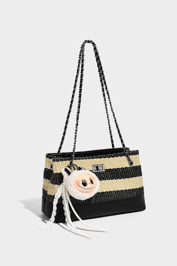 Structured black and beige striped woven shoulder bag with silver chain strap and turn-lock metal clasp, detail view 14