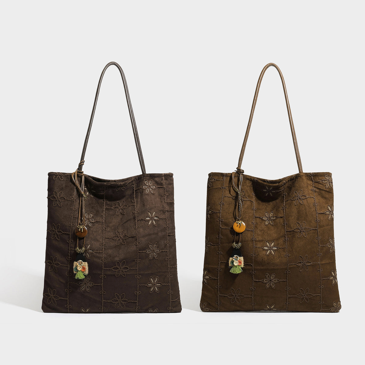 Large soft suede-look shoulder tote bag in dark brown with tonal floral embroidery grid pattern, slim leather-look straps