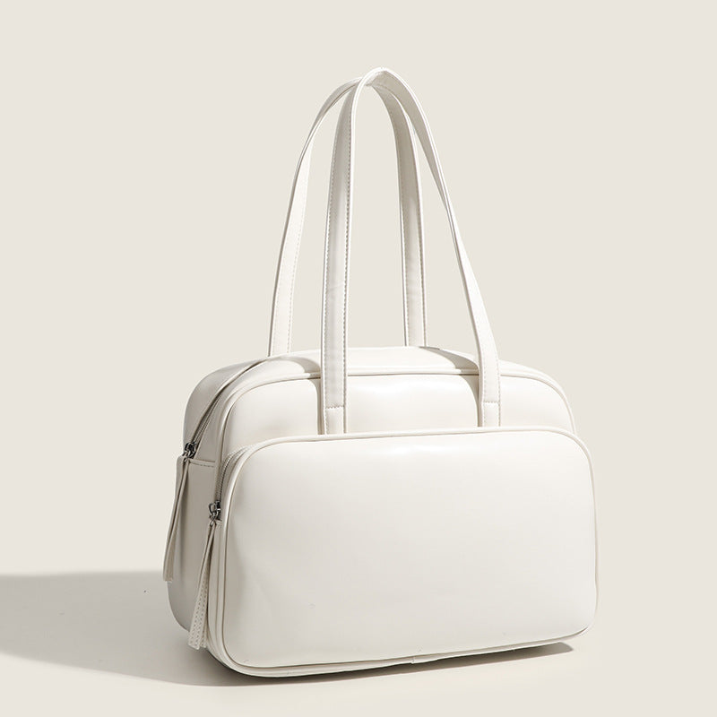 Large structured rectangular leather-look shoulder bag with dual zip compartments and double top handles, detail view 3