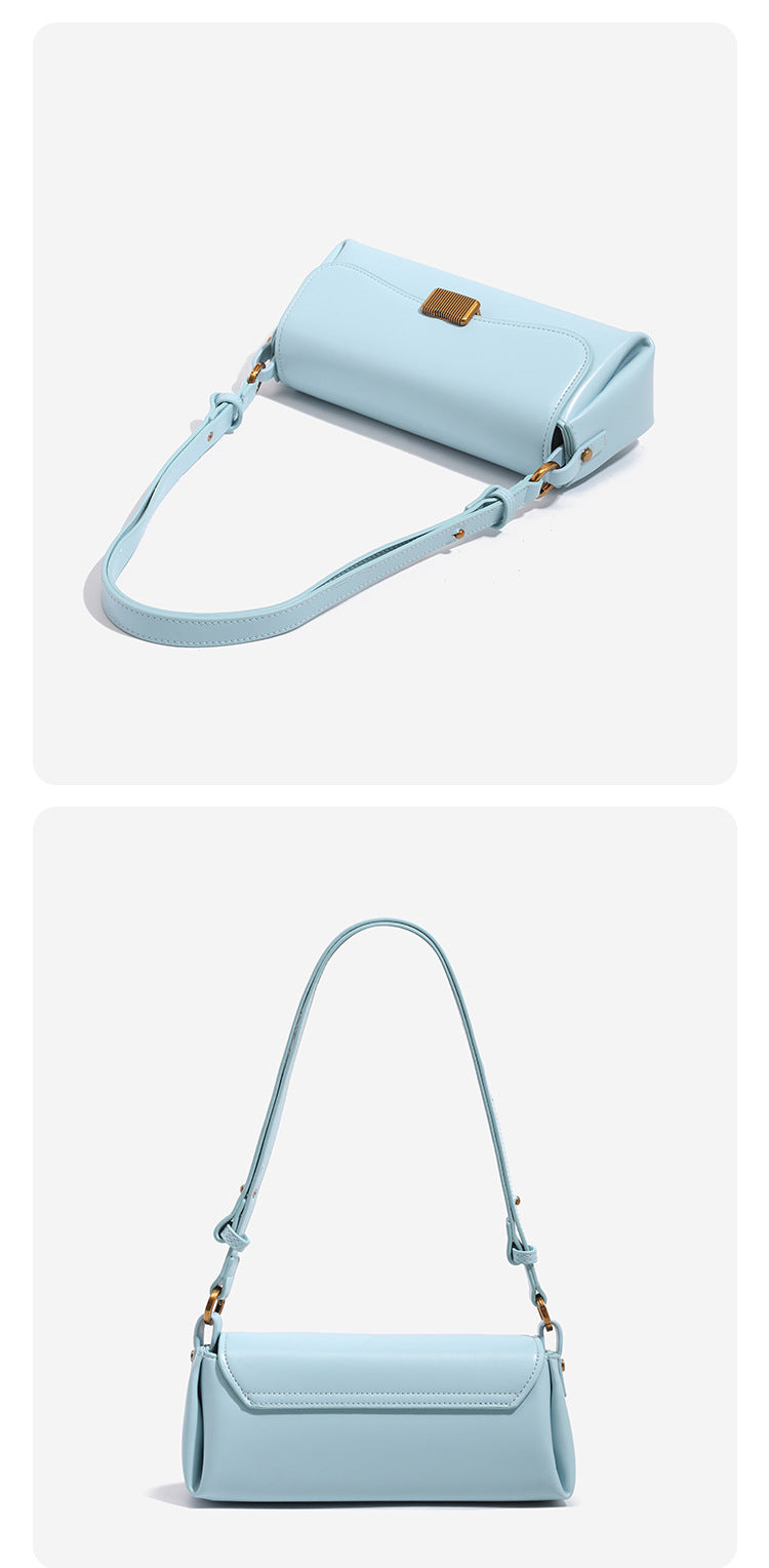 Structured rectangular baguette shoulder bag in pastel sky blue with smooth leather-look finish, ribbed gold-tone turn-lock