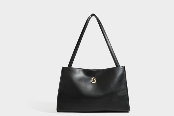 Structured rectangular shoulder tote bag with smooth leather-look finish, long double straps, and gold-tone gourd emblem on