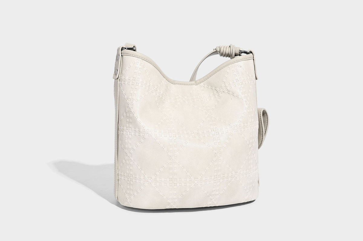 Diamond-quilted leather-look bucket shoulder bag with knotted strap accent and attached mini pouch, detail view 24