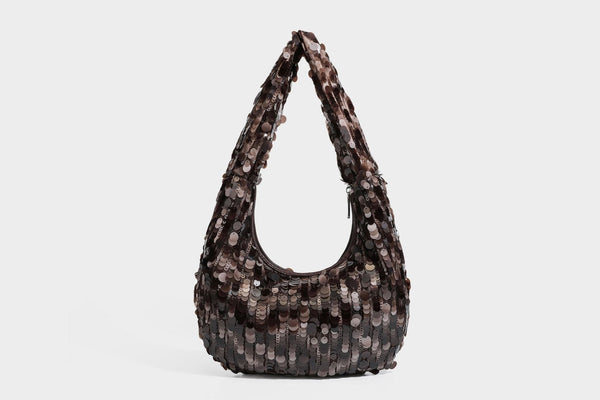 Slouchy crescent hobo shoulder bag covered in overlapping reflective sequin discs with a single integrated strap and top-zip