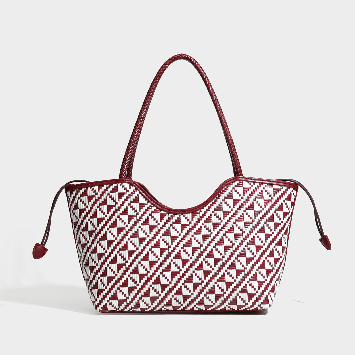 Woven geometric two-tone tote bag with braided shoulder straps and leather-look trim, detail view 9