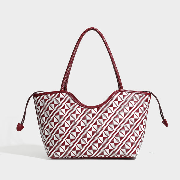 Woven geometric two-tone tote bag with braided shoulder straps and leather-look trim, detail view 9