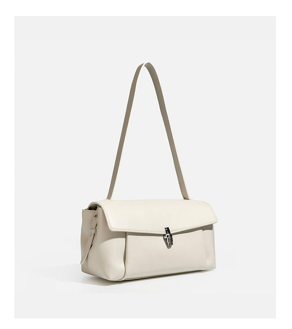 Structured rectangular flap shoulder bag with smooth leather-look finish, silver-tone turn-lock clasp, and long slim