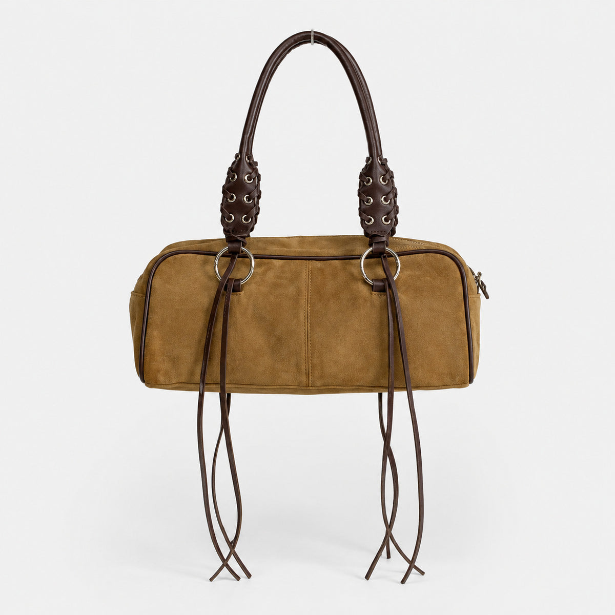 Rectangular suede-look barrel bag with laced eyelet handles, silver O-ring hardware, and hanging leather-look fringe tie