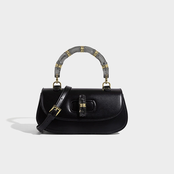Kleine strukturierte Satteltasche mit durchscheinendem rosafarbenem Henkel aus Kunstharz im Bambus-Stil, passendem vorderem Drehverschluss, goldfarben