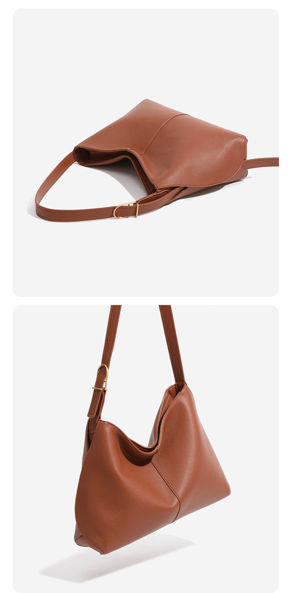 Soft pebbled leather-look hobo shoulder bag with crescent dipped opening, central seam, and adjustable strap, detail view 10