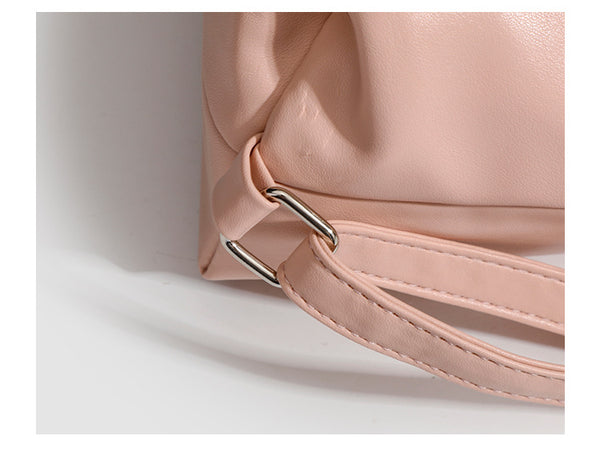 Slouchy hobo shoulder bag with bow detail and silver-tone hardware, detail view 11