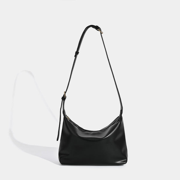Soft slouchy zip shoulder crossbody bag with smooth matte leather-look finish and gold-tone hardware, detail view 8
